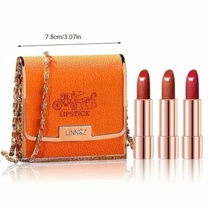 NIB orange metal crossbody multi lipstick holder